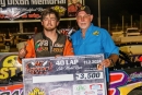 Clay Harris (left), with East Bay Raceway Park owner Al Varnadore (right), earned $3,500 on Nov. 2 for a Crate Late Model victory marking the Gibsonton, Fla., track&#039;s final event. (Matt Butcosk)