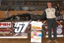 Mike Marlar of Winfield, Tenn., celebrates a $5,000 victory at Scenic Raceway in Oneida, Tenn., during the 2004 season. (Thomas Hendrickson)