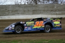 Darren Miller of Chadwick, Ill., overcame suspension problems and a late-race challenge from Steve Francis to win the Jumpin&#039; Joes Hooker Harness 40 at Freeport (Ill.) Raceway Park. (mikerueferphotos.photoreflect.com)